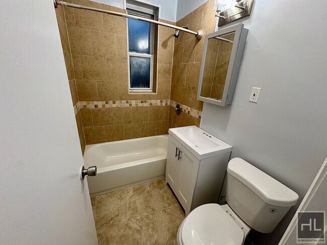 Building Photo - 5993 Riverdale Ave