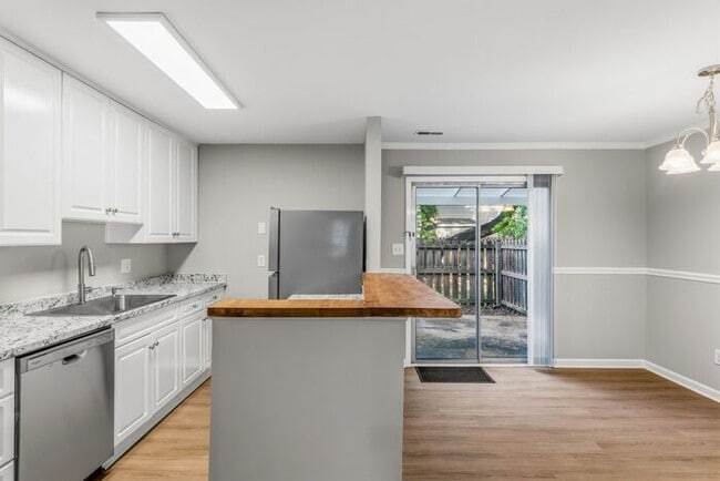 Building Photo - Updated 2-bedroom, 2.5-bath property Greensboro!