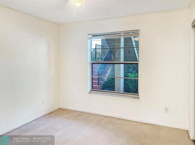 Building Photo - 6090 N Sabal Palm Blvd