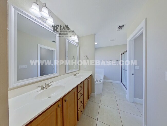 Building Photo - ELEGANT 4/3 + OFFICE IN GATED CHANAN ESTATES | Gas Fireplace + Formal Dining!