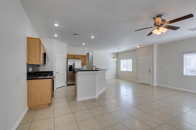 Building Photo - Great townhome in Henderson Gated Community with a 2 car attached garage and backyard