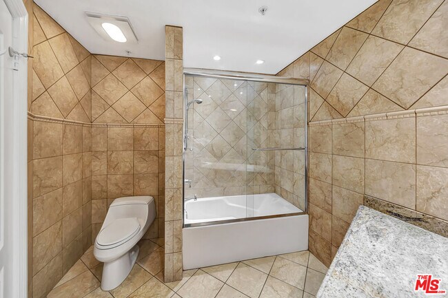 Building Photo - 4477 Woodman Ave