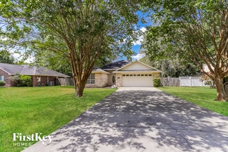 Building Photo - 7122 Woodland Oaks