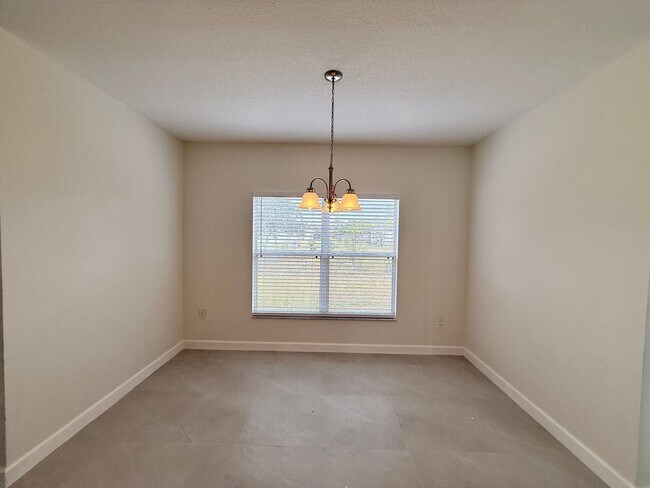 Building Photo - GORGEOUS, Large Completely Renovated Two-Story 4/2.5 PLUS LOFT in POINCIANA VILLAGES!