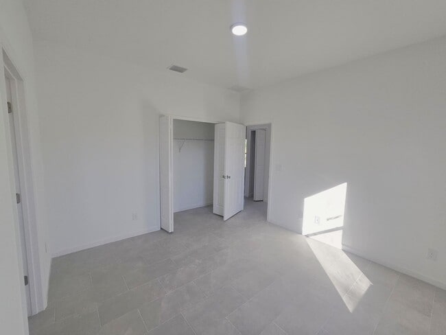 Building Photo - Brand New 2/2/1-PRIME SW LOCATION - Lehigh Acres