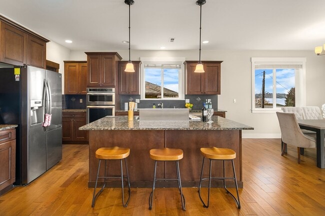 Building Photo - Water Views| Expansive Deck | Flexible Living Spaces