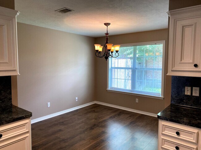 Building Photo - FABULOUS THREE BEDROOM HOME WITH LARGE DECK, FIREPLACE AND FLEX ROOM