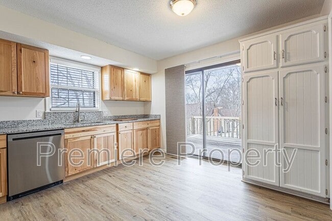 Building Photo - 5708 NW Raintree Ct