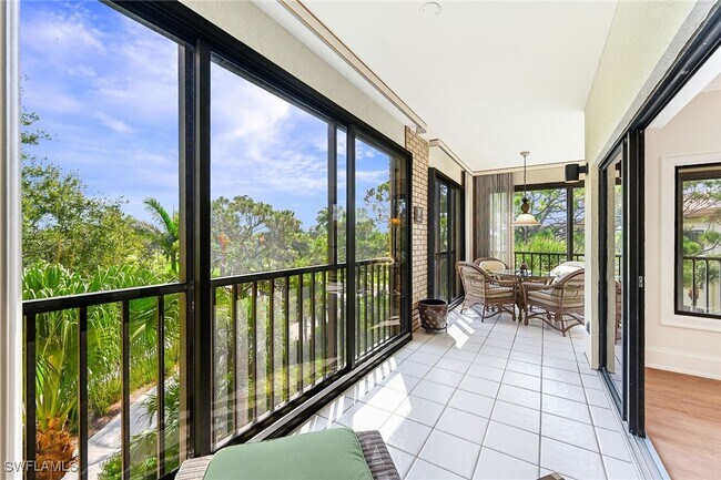 Building Photo - 6770 Pelican Bay Blvd