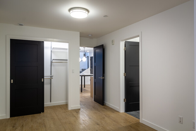 Lighted closet in bedroom with Elfa storage system - 625 Malden Ave E