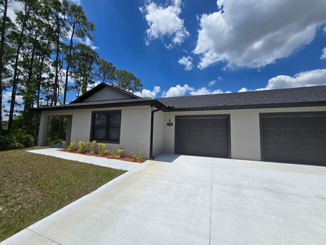 Building Photo - Brand-New 4-Bed Beauty with Attached Garage in Palm Bay – Modern Comfort, Prime Convenience!