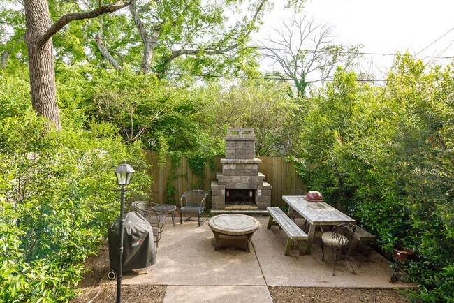 Building Photo - Beautiful Sylvan Park Home with Screened Porch & Outdoor Stone Fireplace