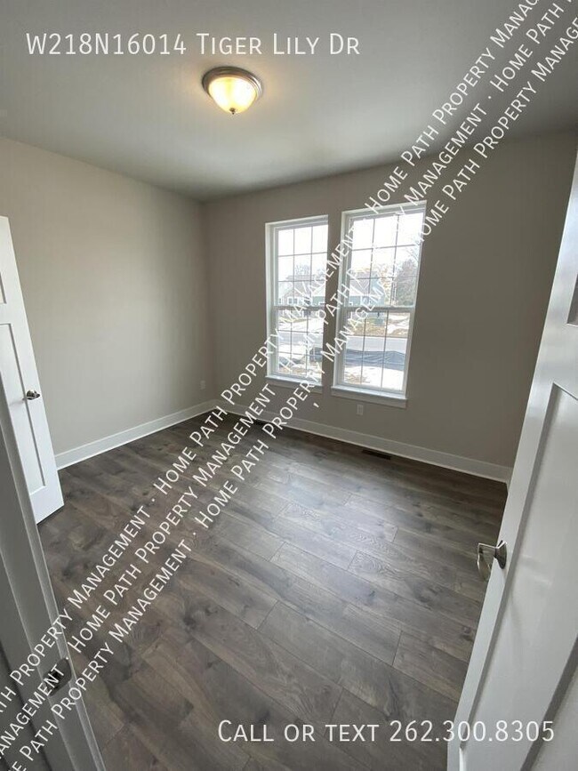 Building Photo - W218N16014 Tiger Lily Dr