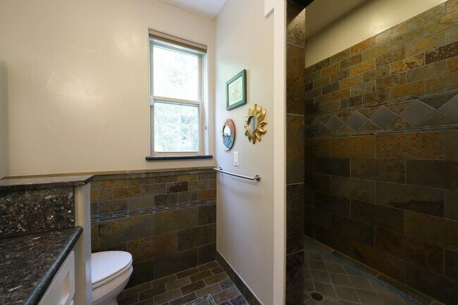 Building Photo - Don't miss this amazing opportunity to rent a higher end home nestled in the trees in the coveted...