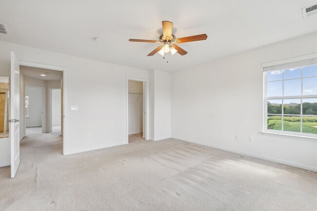 Building Photo - This beautifully maintained end-unit brick...