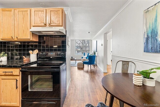 Building Photo - Sunny Corner Condo in the Heart of Capitol Hill | 2 Bed • 2 Bath • 795 Sq. Ft.