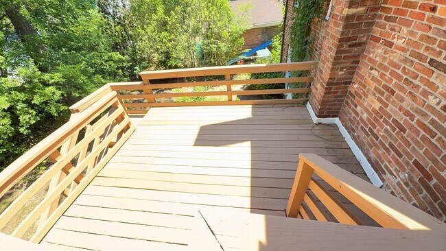 Building Photo - Charming 2BR with Sunroom, Hardwood Floors & Lawn Care Included
