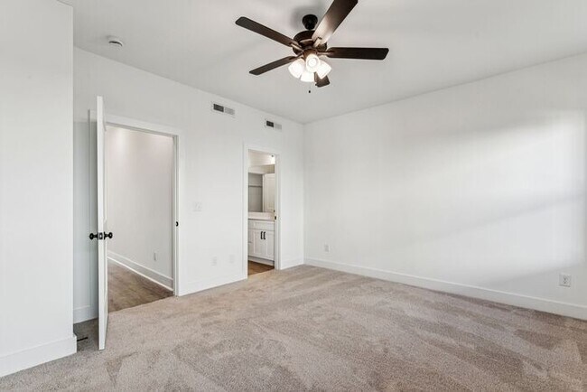 Building Photo - High-End 2BR Townhome | Rooftop Terrace + 2-Car Garage | 24-Unit Commnity