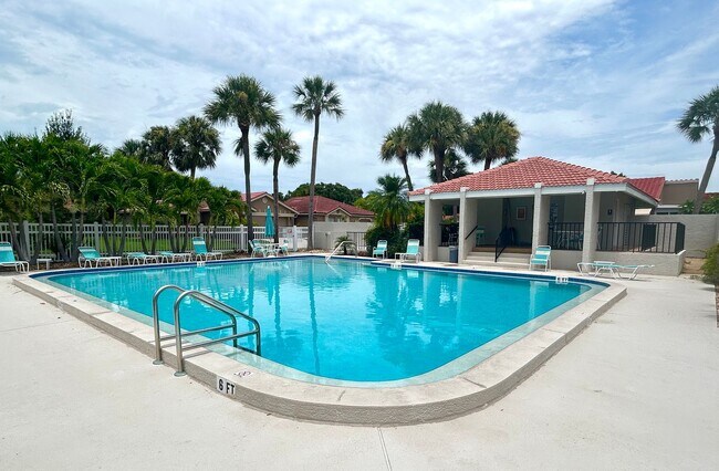 Building Photo - Gorgeous 3 Bed/3 Bath in Tranquil Gated Co...