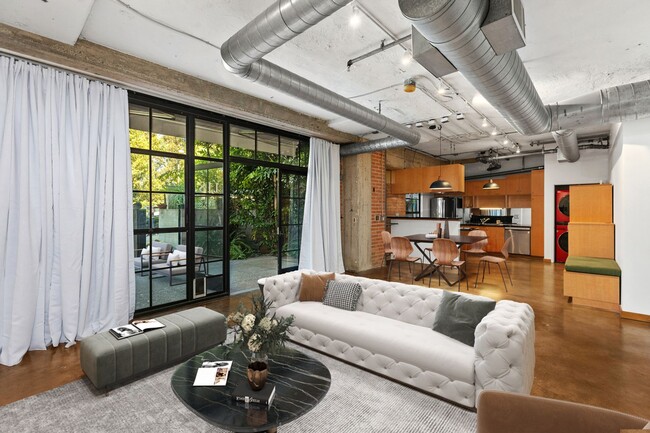 Building Photo - Elevate Your Living: Luxe 916 sq ft Studio...