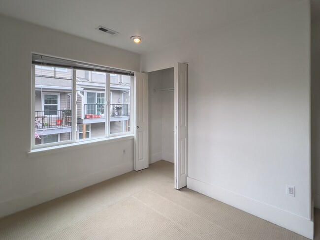 Building Photo - Enjoy this 3 Bedroom 2.5 Bathroom End Townhome ~ 2 Car Garage + Washer & Dryer! Great Cedar Mill ...