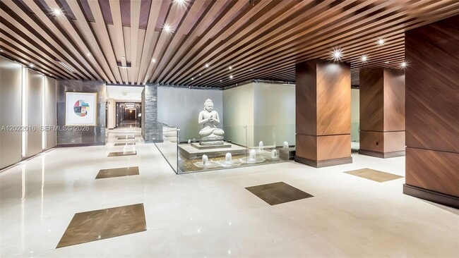 Building Photo - 5875 Collins Ave