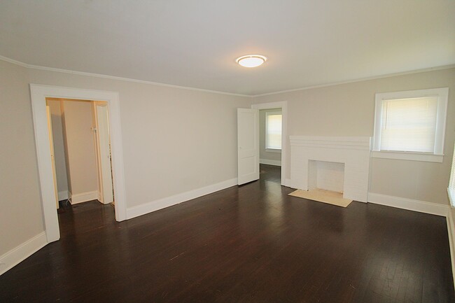 Building Photo - Charming home with updated Kitchen