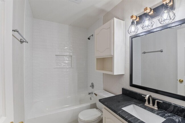 Building Photo - Welcome to this stunningly updated, three-bedroom, two-bath home located in the desirable Valley ...