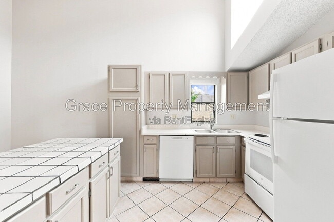 Building Photo - 8917 E Chenango Ave