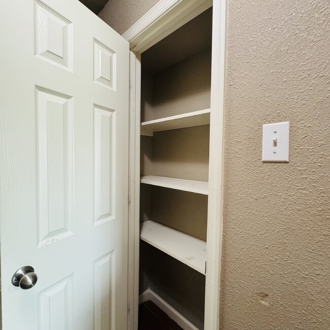 Building Photo - Welcome to Pine Shadows Duplex Apartment