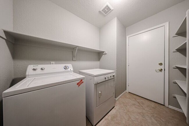 Building Photo - Introducing a stunning 4-bedroom, 2.5-bath...