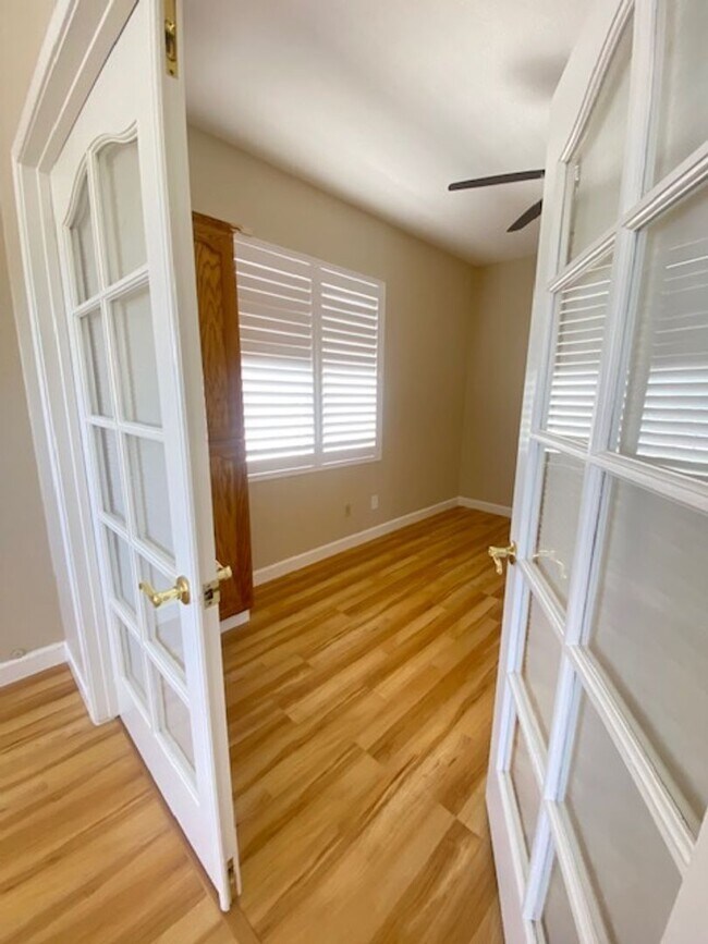 Building Photo - Spacious 5-Bedroom Home with Solar, Stunning Sunroom & Upgraded Bathrooms!