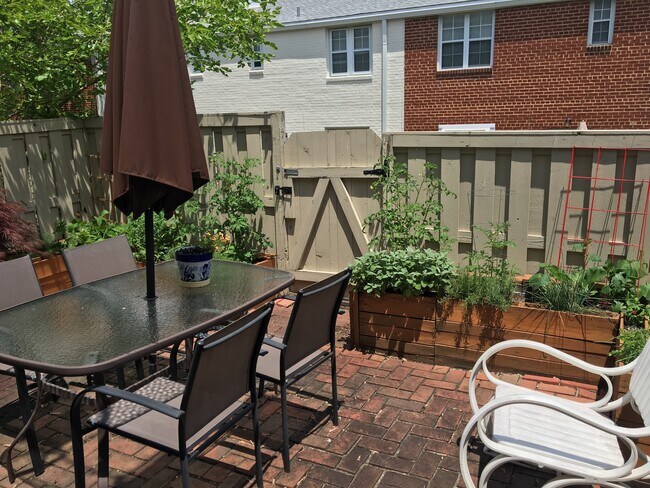 Patio with garden beds - 3757 Jason Ave