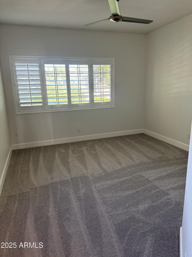 Building Photo - 7960 E Pepper Tree Ln