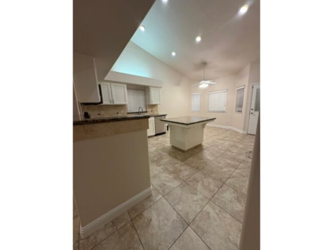 Building Photo - New price !Dont miss this open concept, big kithen with fresh paint and flooring