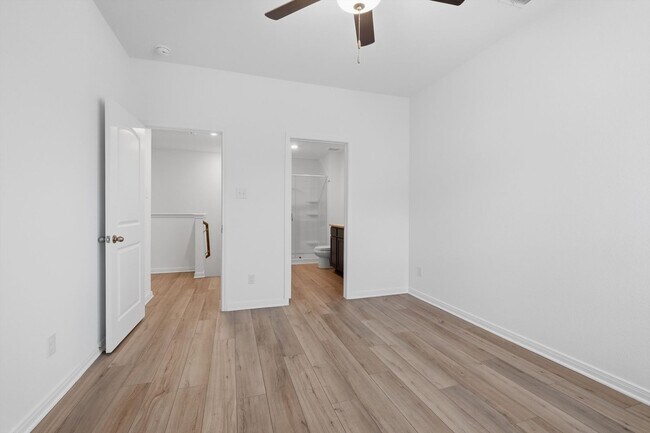Building Photo - Clean & Modern Townhome with No Carpet and Lawn Service Included