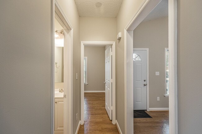 Building Photo - Like New Home off Freeman Mill.  Just Painted, New Wood/Vinyl Flooring, Vaulted Ceilings, Front P...