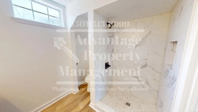 Building Photo - Showings Available!