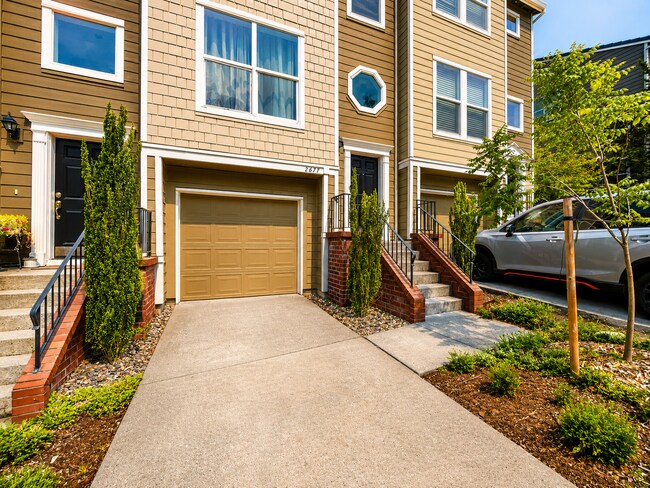 Building Photo - Spacious 3-Bedroom Forest Heights Townhome with Dual Primary Suites, Ground-Level Bedroom, Privat...