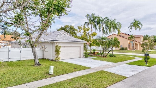 Building Photo - Northwest 19th Street, Miami, FL 33029 - 3 BR 2 BA single-family home
