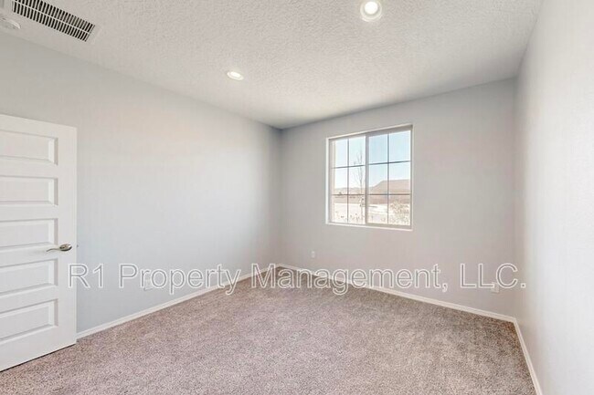 Building Photo - 6405 Kings Cyn Cv NE