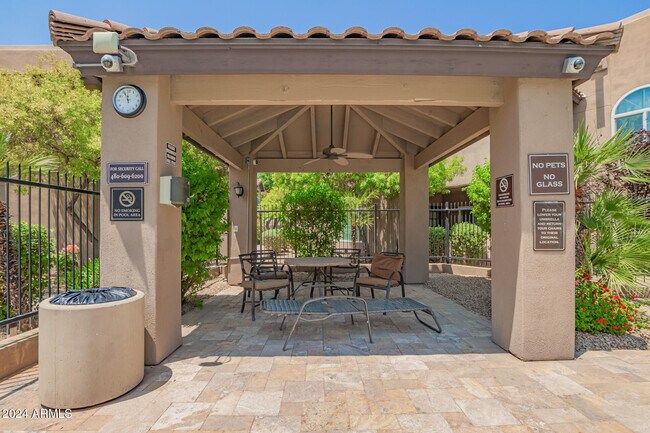 Building Photo - 9450 E Becker Ln