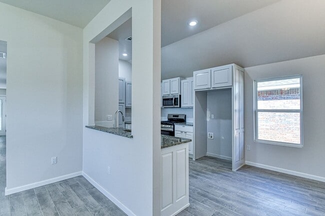 Building Photo - Brand New Construction!  Lawn care included!