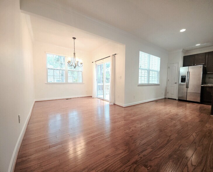 Dining room connected seamlessly to the kitchen - 1207 Heritage Links Dr