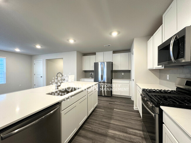 Building Photo - Brand-New 5-Bed Home with Basement & Flex ...