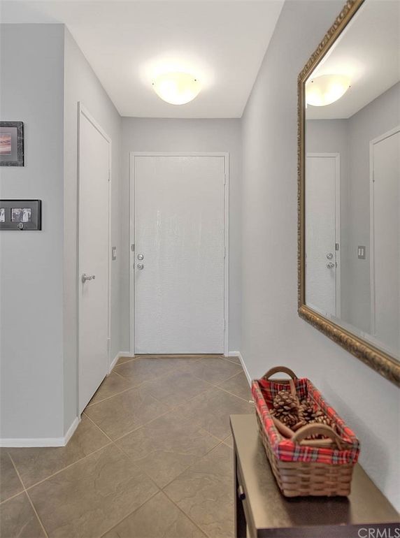 Front entrance and coat closet - 1073 S Romney Dr