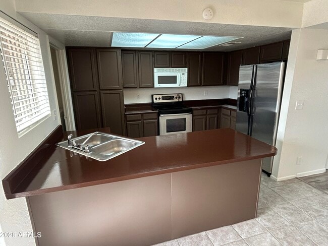 Building Photo - 5827 N 59th Dr