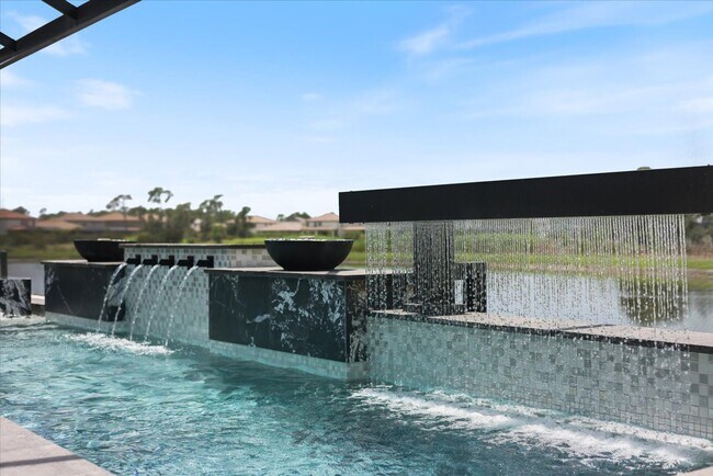Building Photo - Luxury Home w/ Pool, Outdoor Kitchen, Car Lift, & Water View In Parrish!