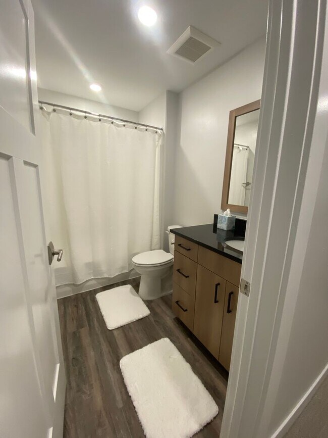 Building Photo - Fully Furnished  2BR, 2.5 Bathroom Townhome With attached 2 car Garage