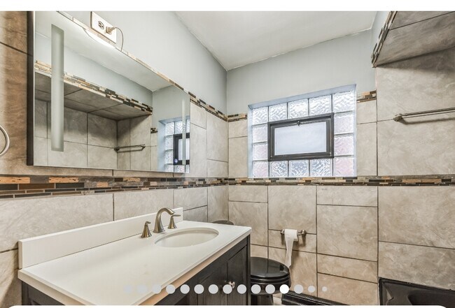 Building Photo - 8736 S Cornell Ave